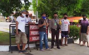 Bhabinkamtibmas Polres Gorontalo Kota Ini Rutin Beri Imbauan ke Masyarakat tentang Prokes