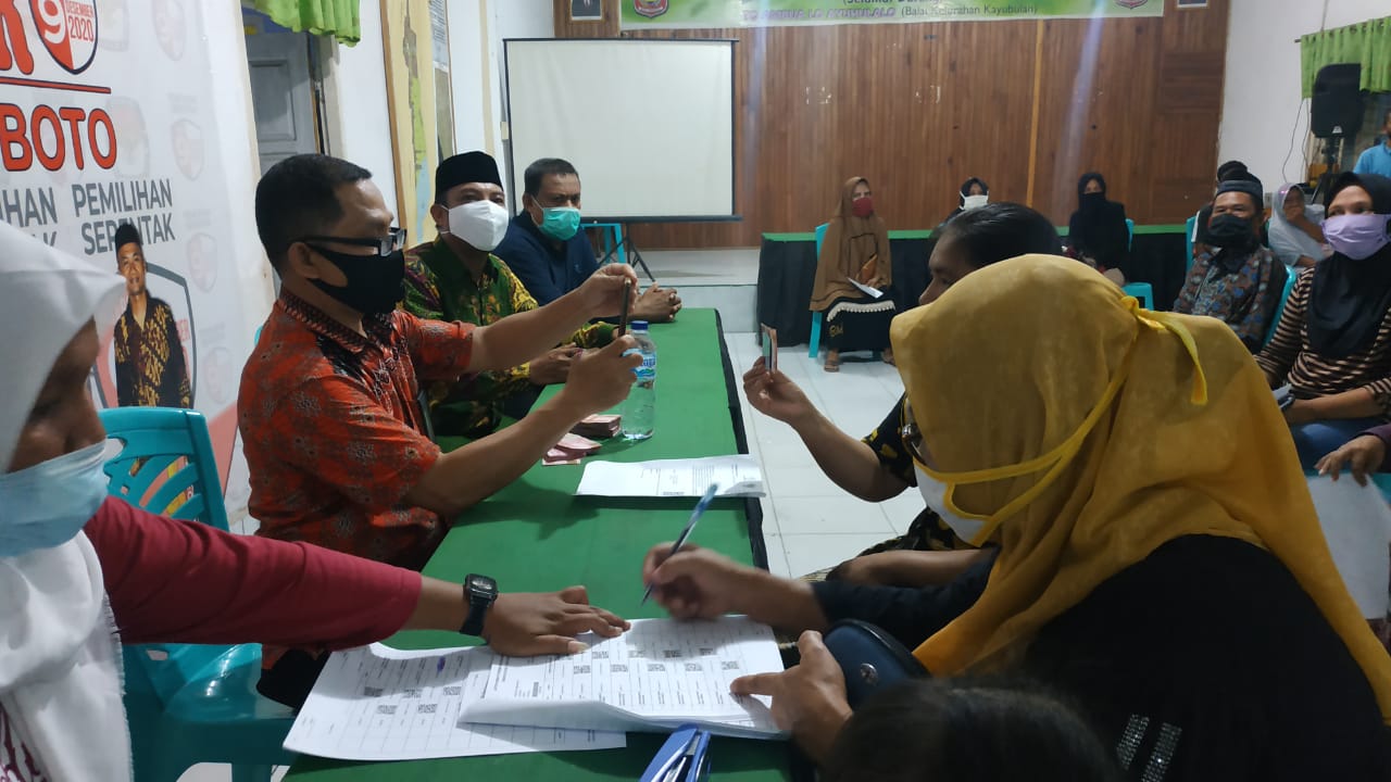 Penyerahan BST di Kayubulan Tetap Perhatikan Protokol Kesehatan