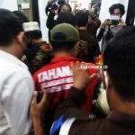 Arfan Igrisa, Direktur PT Putri Sinar Buana saat digiring oleh Kejaksaan Negeri Gorontalo/Fandiyanto Pou