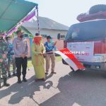 Suharsi Igirisa saat melepas distribusi beras ke seluruh kecamatan di Pohuwato/Hendrik Gani