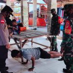 Masyarakat yang melanggar protkes, dan langsung di berikan tindakan Push Up di tempat/Hendrik Gani