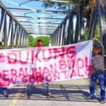 Salah satu spanduk aspirasi warga Buol yang ingin bergabung dengan Provinsi Gorontalo. (Sumber: FB Effendydpatande).