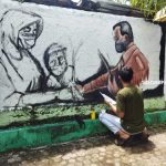 Seorang seniman dalam Mural Bhayangkari Festival 2021 di Gorontalo/Fandiyanto Pou