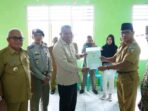 Pemda dan BPN Bolmut Serahkan 101 Sertifikat Tanah ke Warga