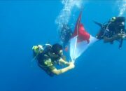 Pecinta Alam Gorontalo Kibarkan Bendera Dalam Laut Oluhuta