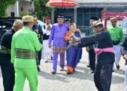 Reses Pertama, Anggota DPD Syarif Mbuinga Disambut dengan Adat Mopotilolo